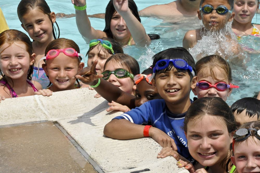 Campers enjoying the pool at Glenelg Country School.