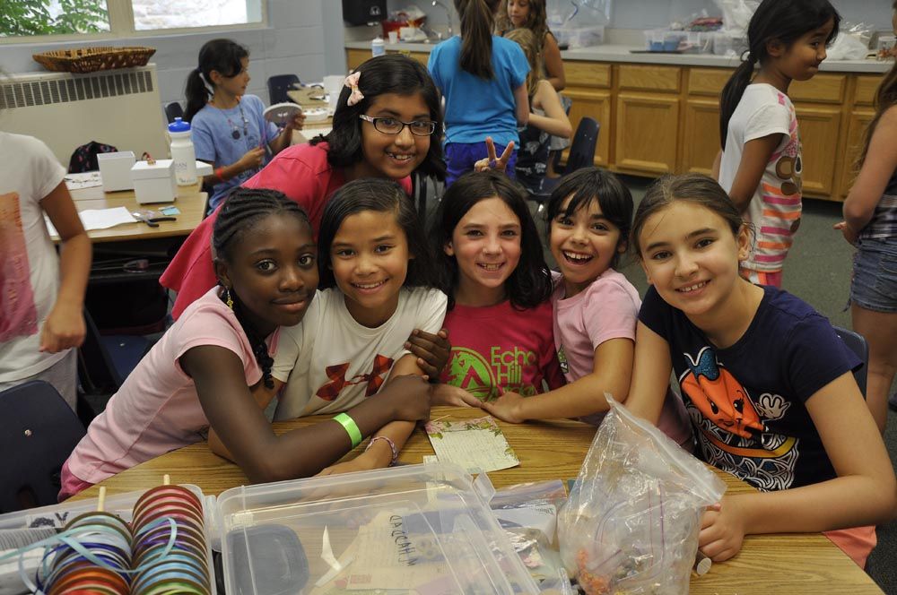 Campers gather today for a group photo during an arts and crafts camp.