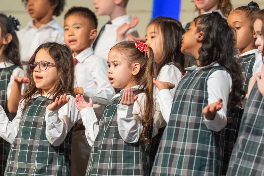 Children perform a song