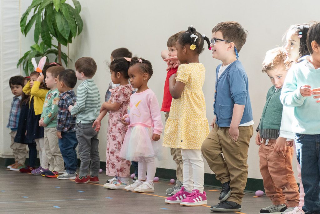 Preschool kids line up for a performance.